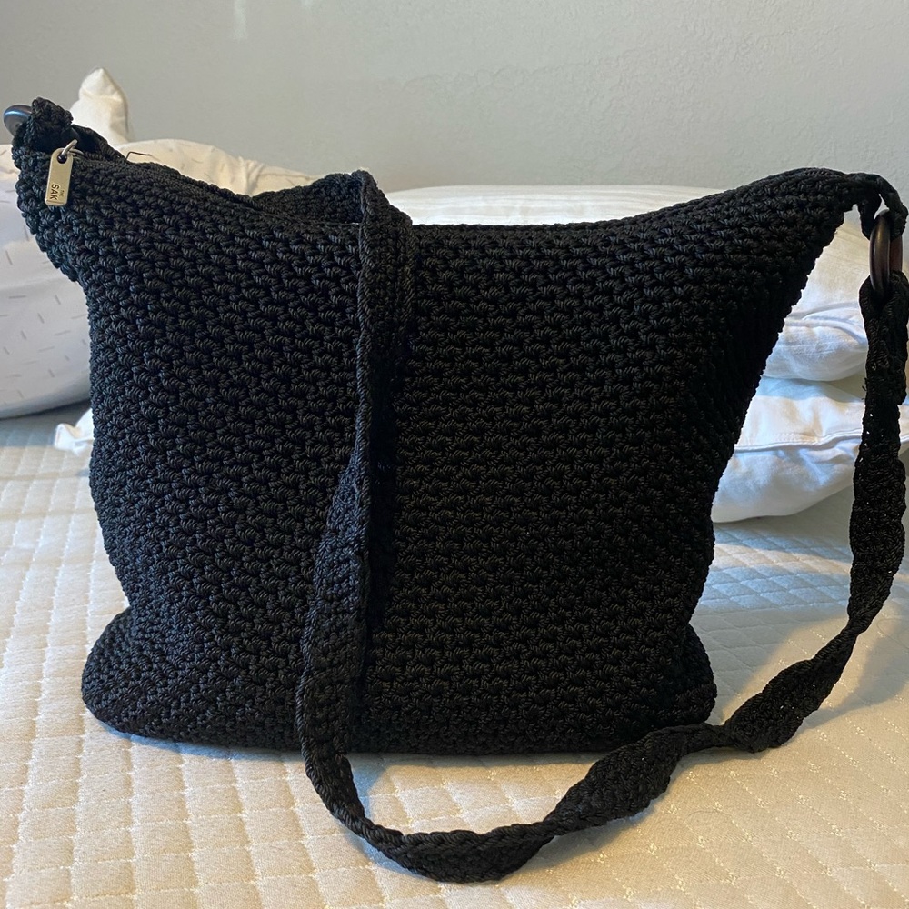 The SAK black knitted bag